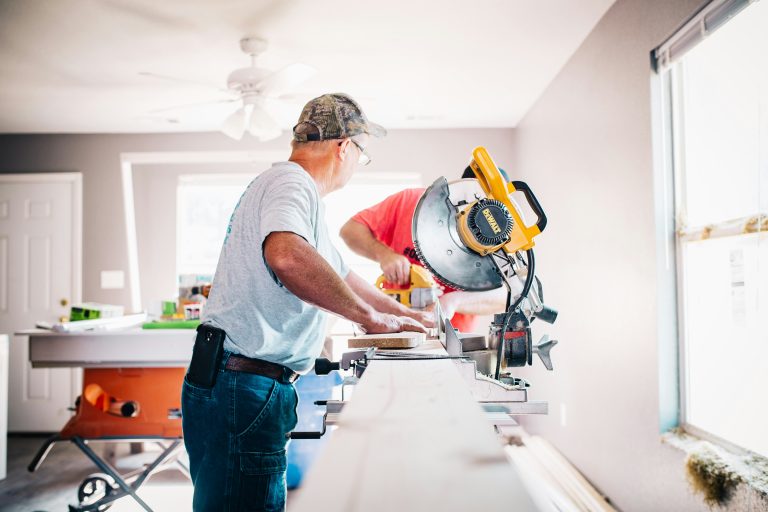 handyman working with circular saw