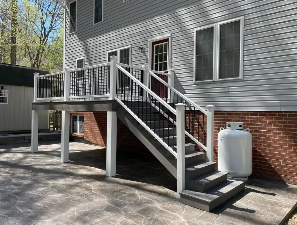 Deck Building in Chesterfield & Richmond | Peachers composite deck with stamped concrete patio in chesterfield va