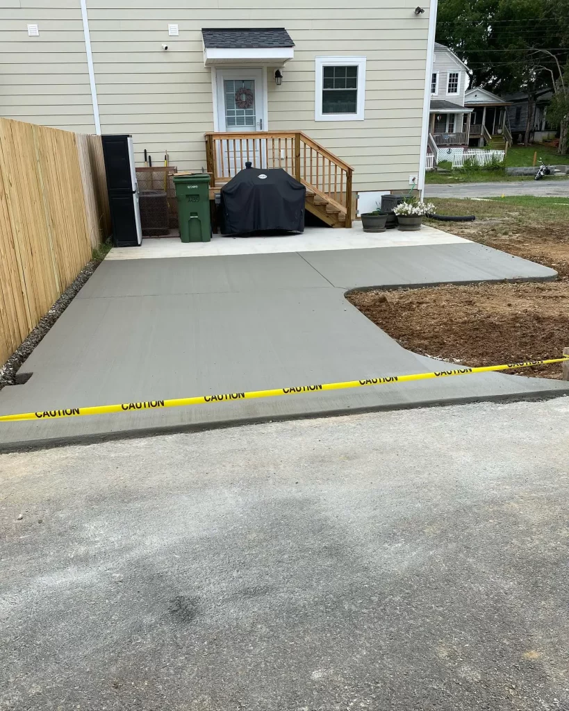 Driveways & Paving in Chesterfield & Richmond | Peachers freshly finished concrete driveway with caution tape in richmond va