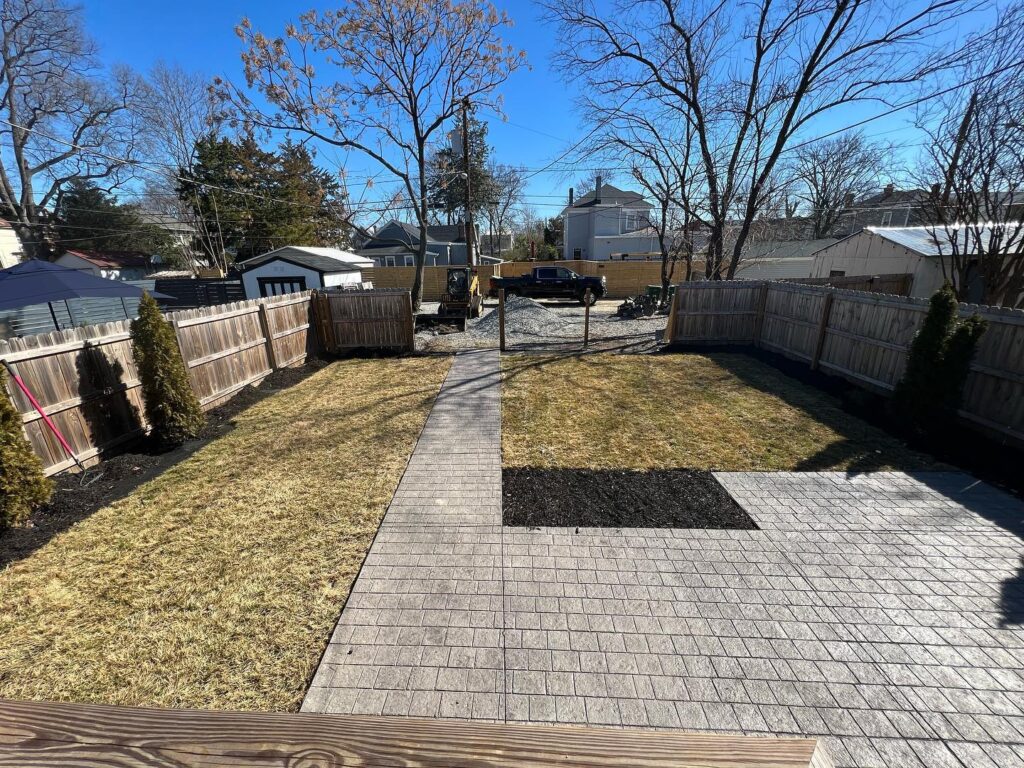 Patios & Concrete in Chesterfield & Richmond | Peachers concrete stamped patio and walkway in backyard in chesterfield virginia
